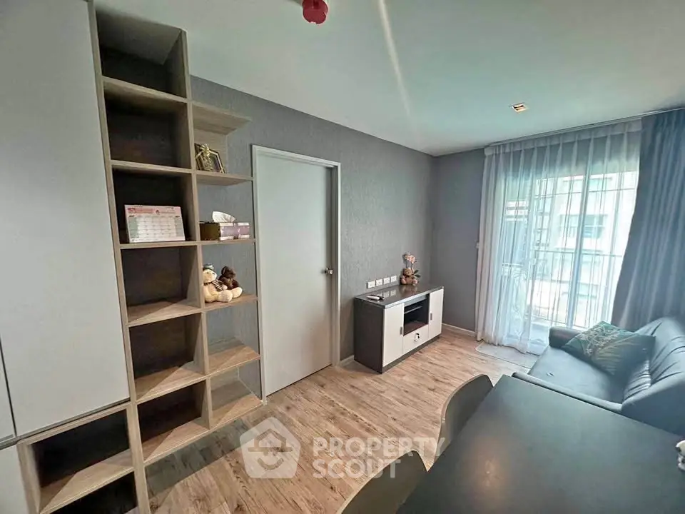 Modern living room with stylish shelving and cozy seating area