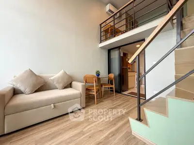 Modern loft apartment with stylish mezzanine and cozy living area