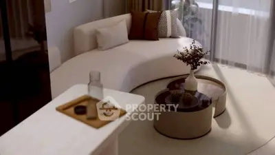 Elegant living room with modern curved sofa and stylish decor