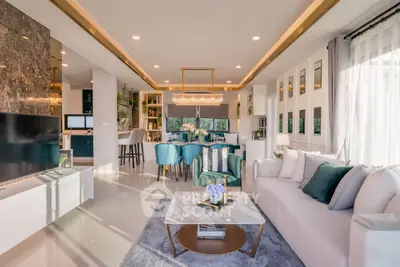Luxurious open-plan living room with elegant decor and modern furnishings