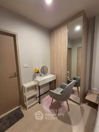 Chic modern bedroom corner with stylish vanity and mirror