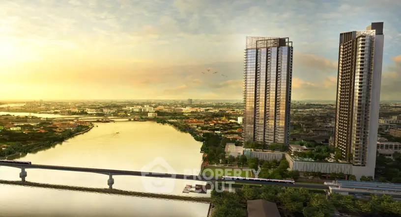 Stunning riverfront high-rise buildings with panoramic city views at sunset