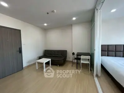 Modern studio apartment with open layout and stylish furnishings