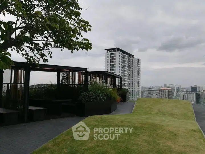 Stunning rooftop garden with city skyline views, perfect for relaxation and leisure.