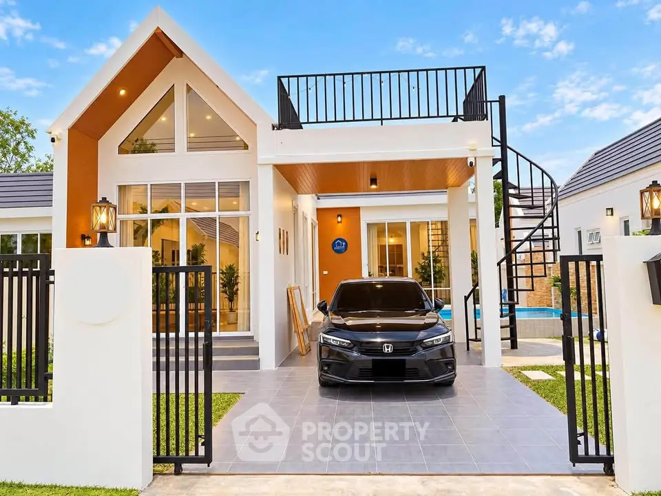 Modern house with sleek design, spacious balcony, and stylish carport in a serene neighborhood.