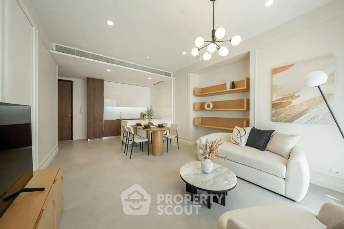 Modern open-plan living room with stylish furniture and elegant decor