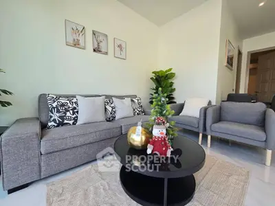 Stylish living room with modern decor and cozy seating area.