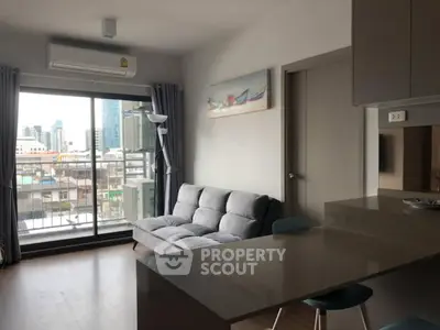 Modern living room with city view and stylish decor