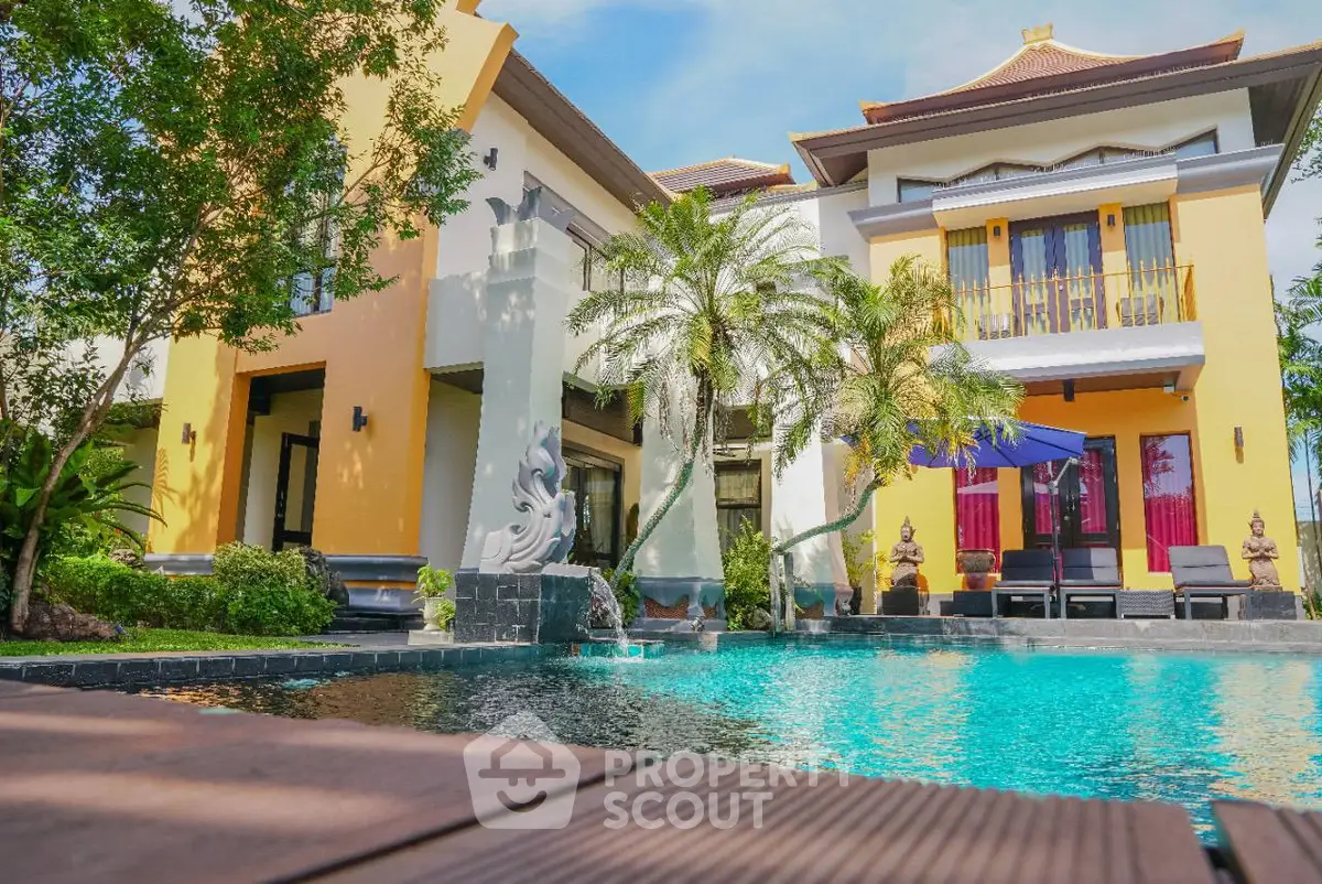 Luxurious tropical villa with private pool and lush garden, perfect for serene living.