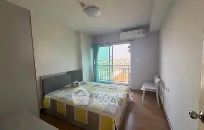 Bright bedroom with balcony view in modern apartment