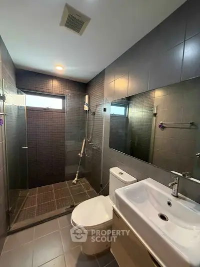 Modern bathroom with sleek design and spacious shower area