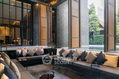 Luxurious living room with modern design and large windows offering stunning views.