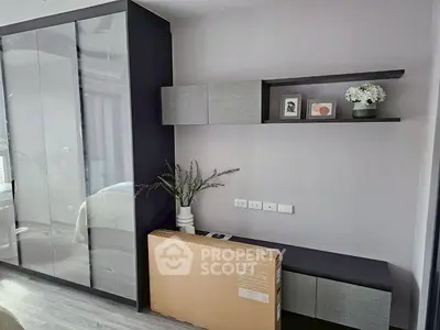 Modern bedroom with sleek wardrobe and stylish decor