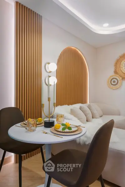 Stylish modern living room with cozy dining area and elegant decor