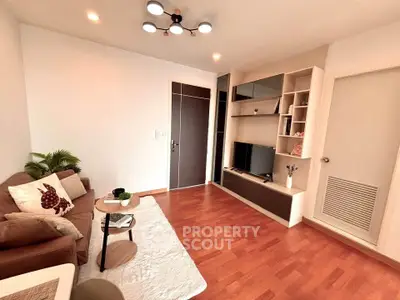 Modern living room with stylish decor and built-in shelving unit