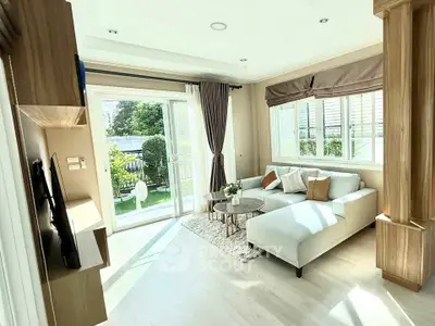 Bright and airy living room with garden view and modern decor