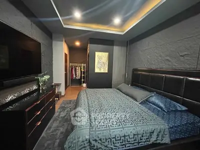 Luxurious modern bedroom with elegant decor and spacious layout