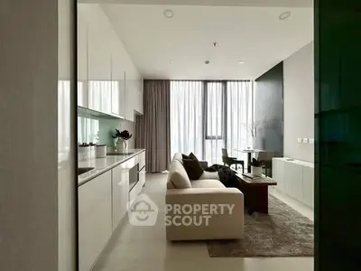 Modern living room with sleek design and large window for natural light