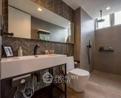 Modern bathroom with sleek design and rainfall showerhead