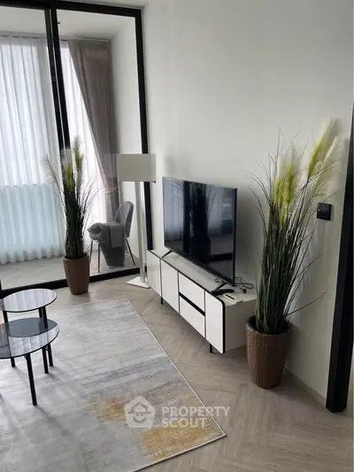 Modern living room with sleek TV setup and elegant decor