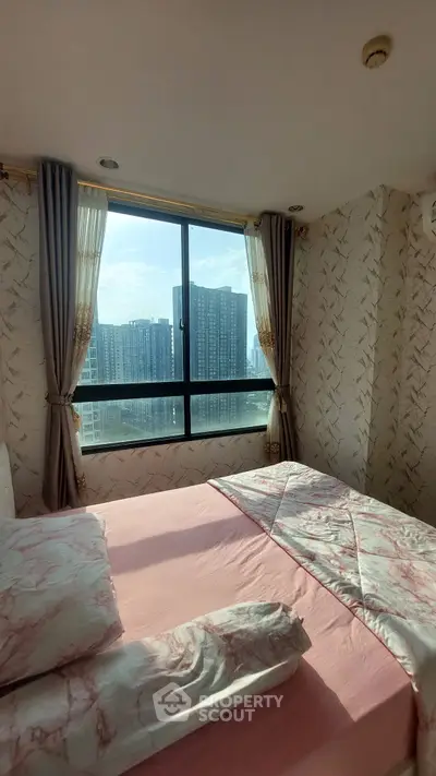 Cozy bedroom with large window offering stunning city view, elegant curtains, and stylish bedding.