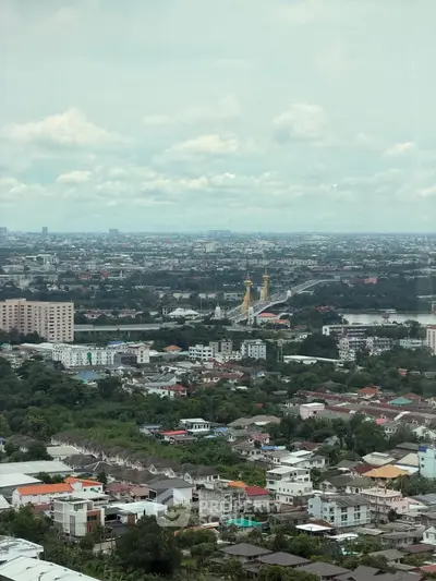 Stunning cityscape view from high-rise building showcasing urban landscape and skyline.