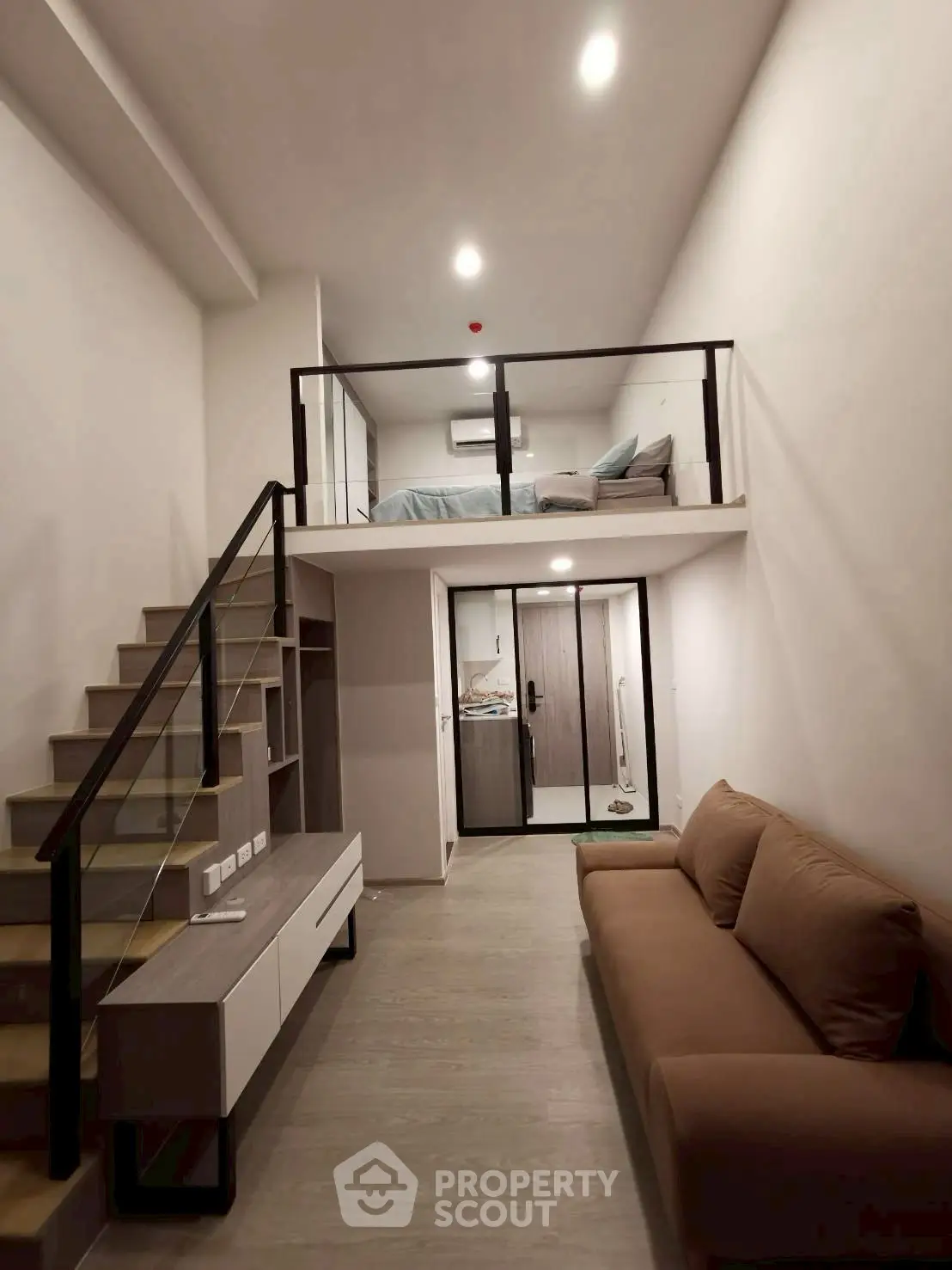 Modern loft apartment with mezzanine bedroom and stylish living area