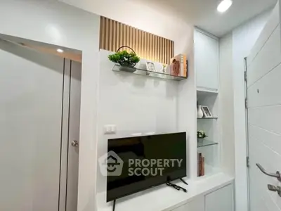 Modern living room with sleek TV setup and stylish decor