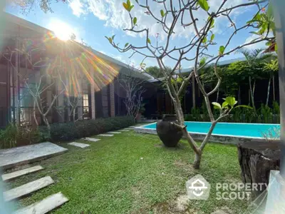 Stunning modern villa with lush garden and private pool, perfect for luxury living.