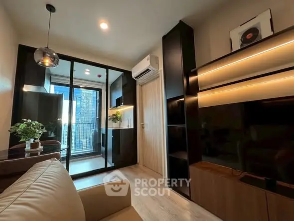 Modern living room with sleek design and balcony view in urban apartment