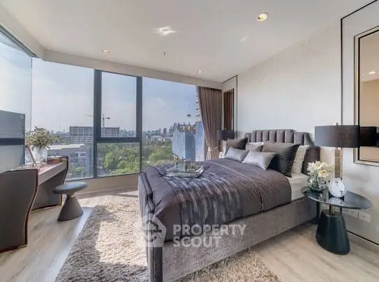 Luxurious bedroom with panoramic city view and elegant decor