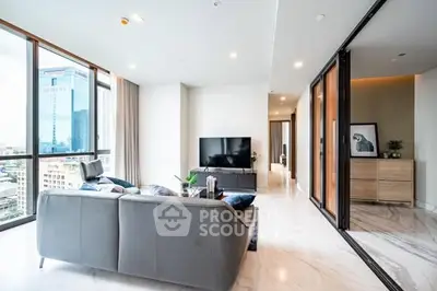 Luxurious modern living room with city view, sleek furniture, and elegant decor in high-rise apartment.