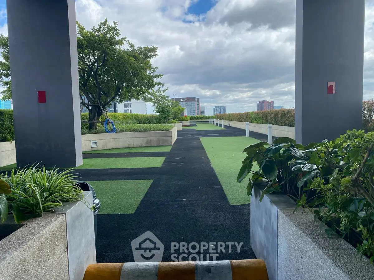 Stunning rooftop garden with lush greenery and city views, perfect for relaxation and leisure.