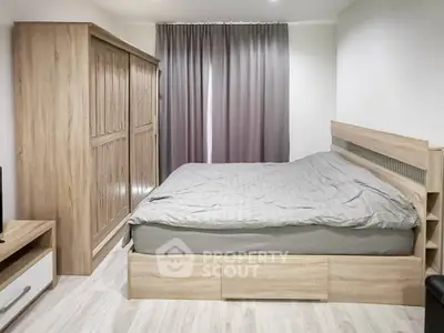 Modern bedroom with wooden furniture and cozy ambiance