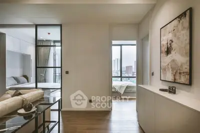 Modern apartment interior with stylish decor and city view, featuring a cozy living area and elegant bedroom.