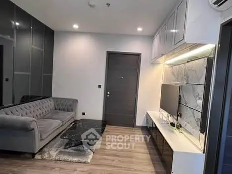 Modern living room with sleek design and elegant furniture