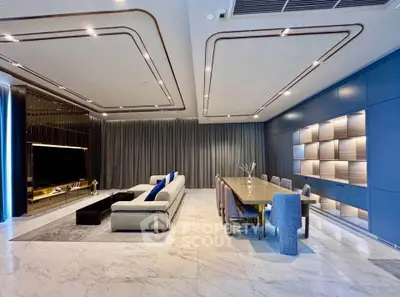 Luxurious modern living room with elegant dining area, featuring sleek marble flooring and stylish ceiling design.