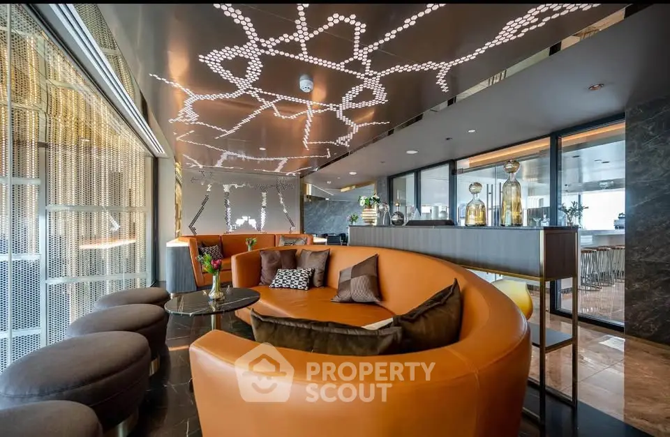 Luxurious modern lounge with unique ceiling design and stylish furniture