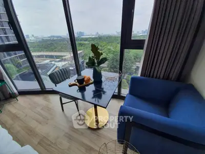 Modern living room with panoramic city view and stylish furniture
