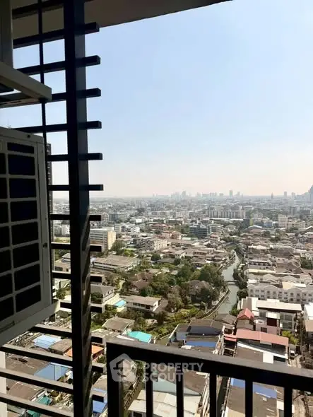 Stunning high-rise city view from balcony with expansive skyline