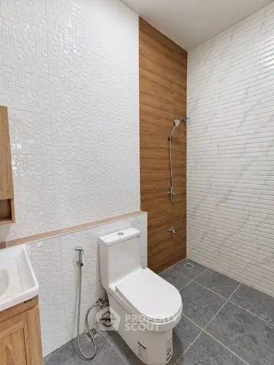 Modern bathroom with sleek design and stylish tile accents