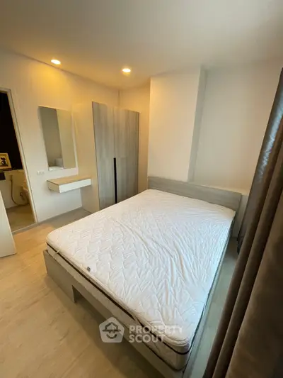 Modern bedroom with minimalist design and cozy lighting