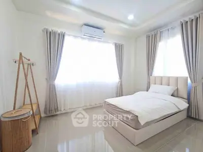Bright and airy bedroom with modern decor and natural light