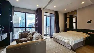Luxurious bedroom with city view and private balcony in modern apartment