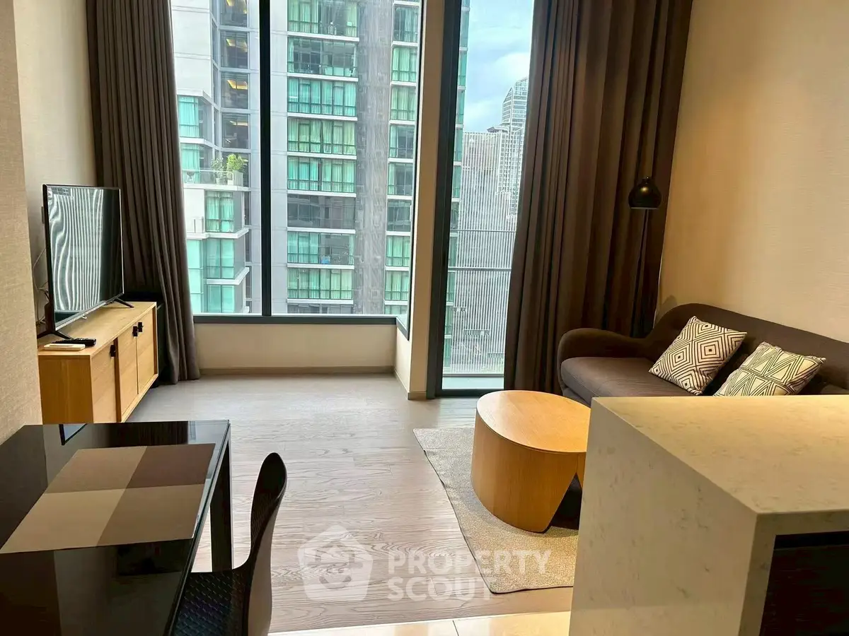 Modern living room with large windows and city view, featuring stylish furniture and sleek design.