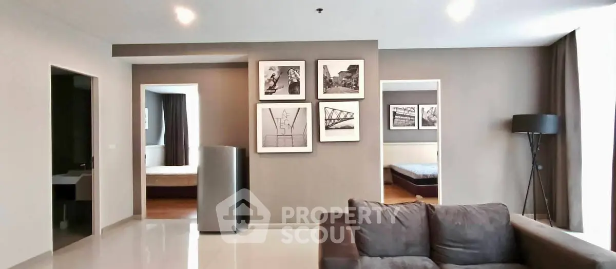 Spacious modern living room with stylish decor and natural light