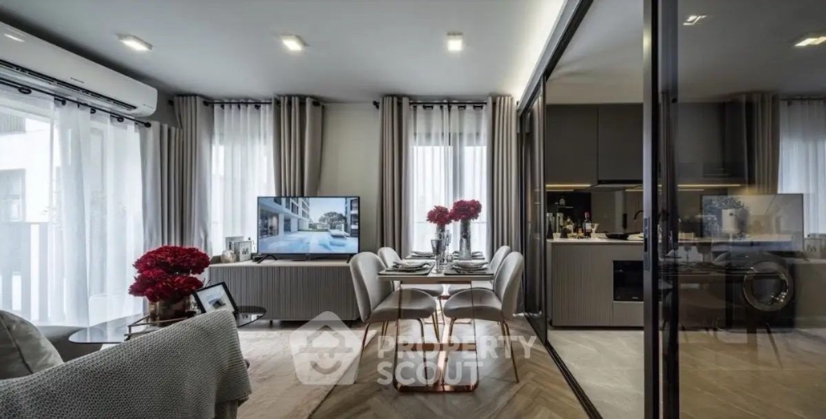 Modern living room with elegant dining area and stylish decor