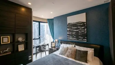 Luxurious bedroom with city view and stylish decor in modern apartment