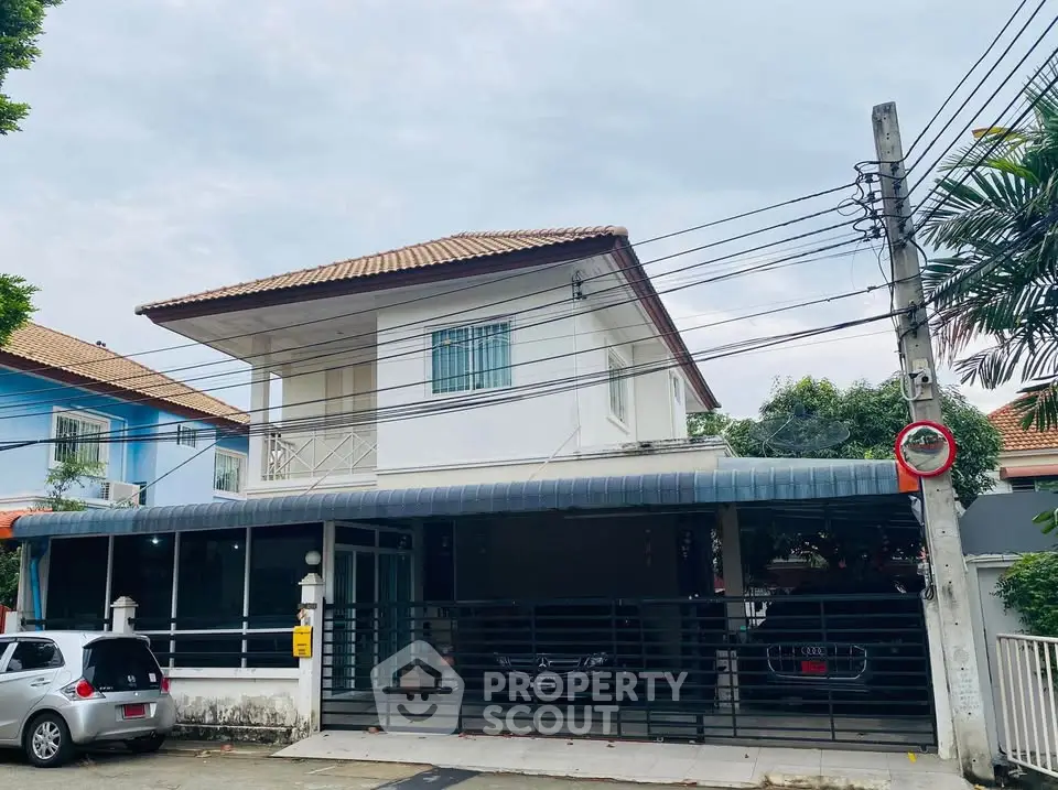 Charming two-story house with spacious parking and modern design