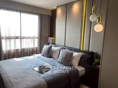 Luxurious modern bedroom with elegant lighting and large window